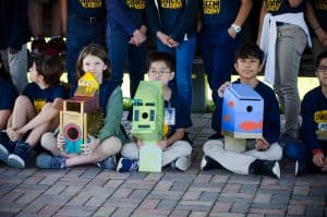 Youngblood Intermediate students sit with their birdhouses