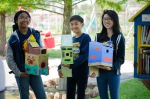 Youngblood students with their handmade birdhouses